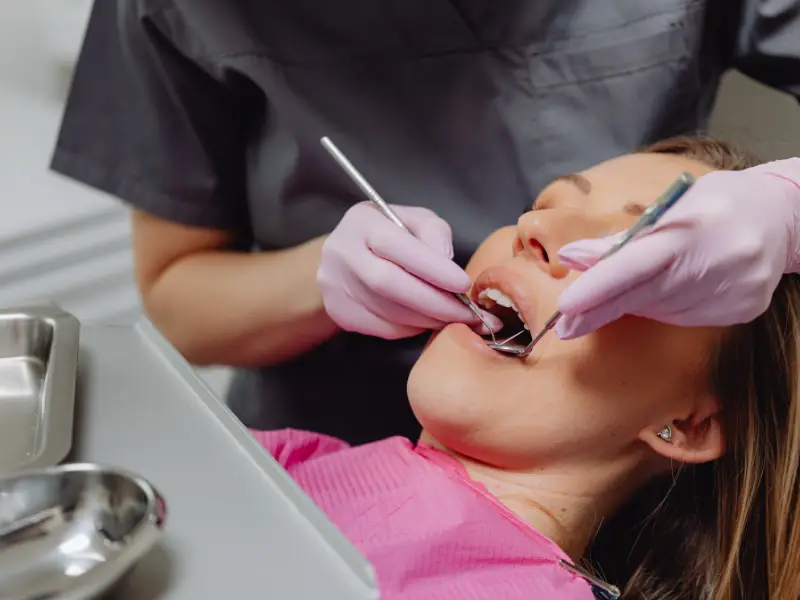 Dentist providing emergency dental treatment to patient at Levin Dental Centre